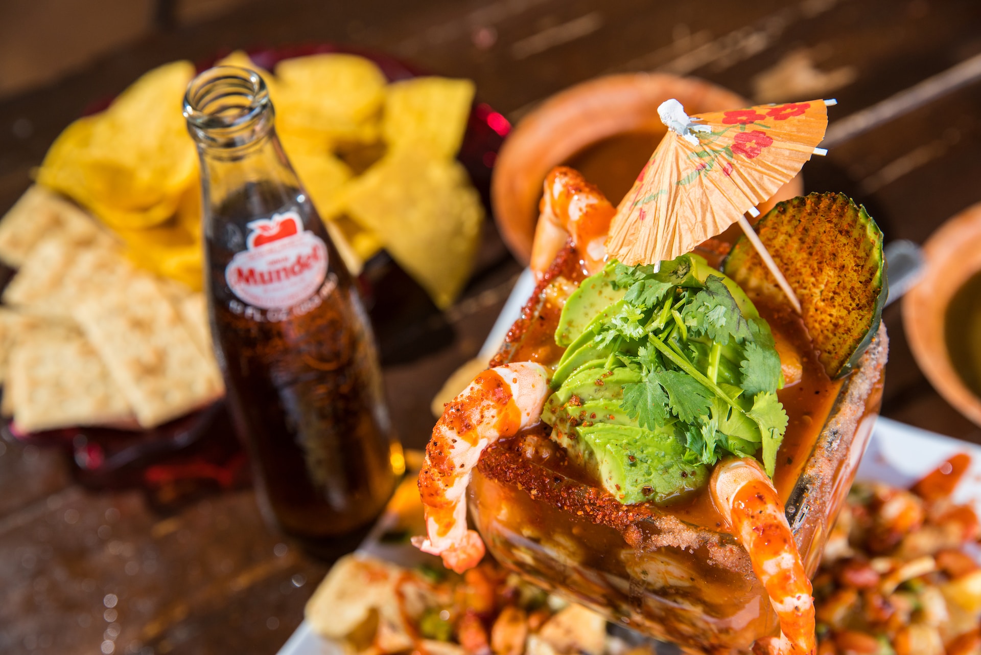 a plate of seafood and a drink