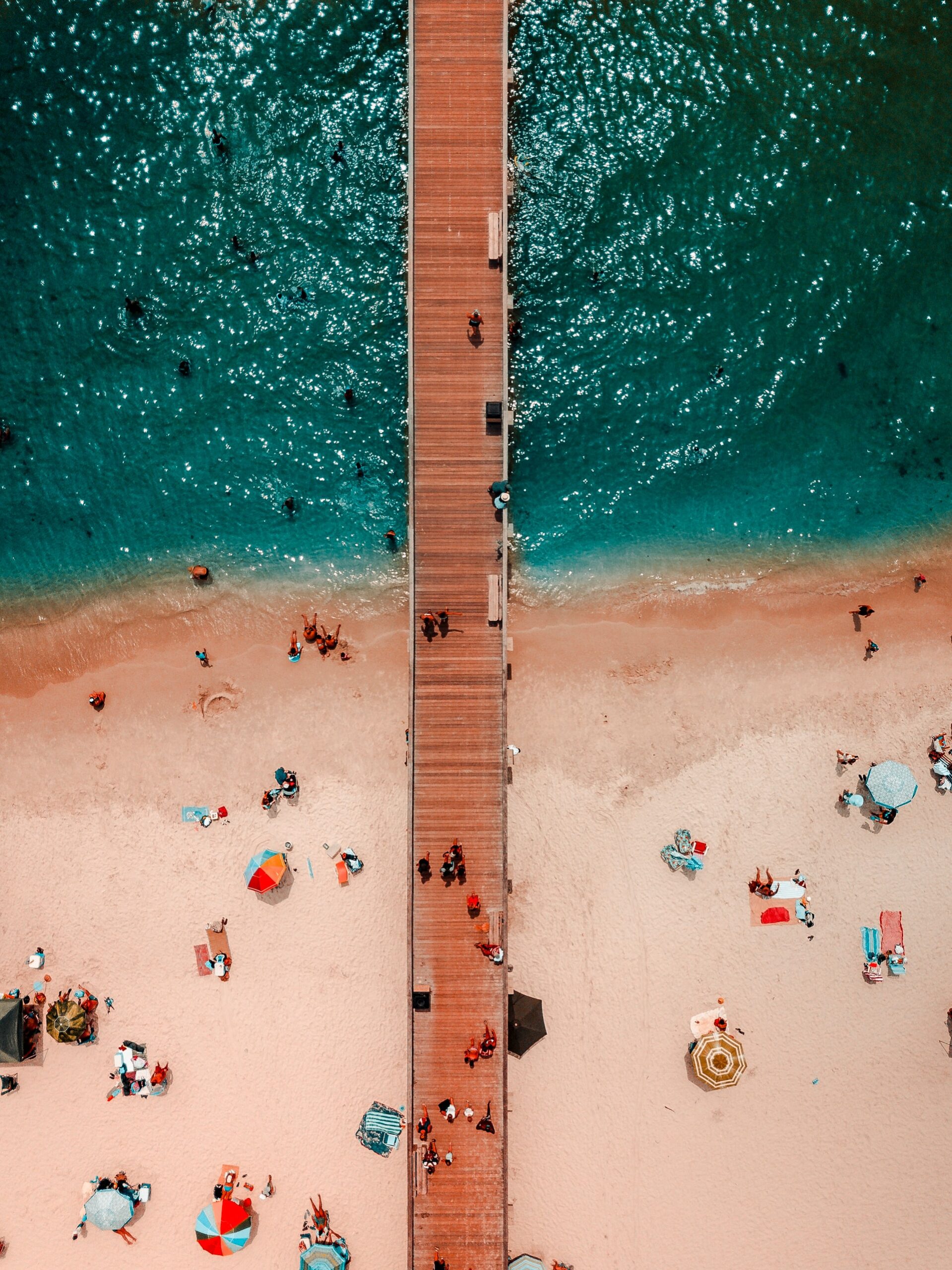 beautiful beach and pier over water in naples, fl